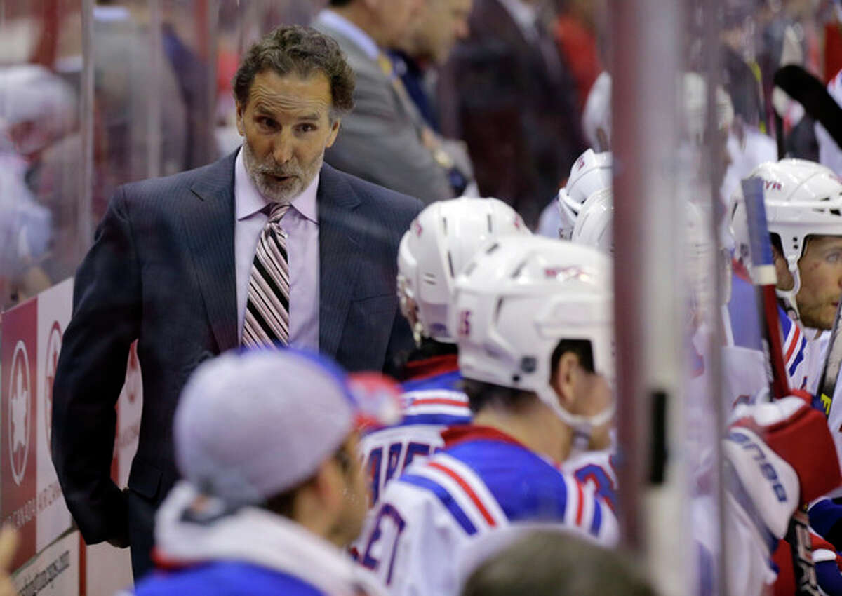 FILE - In this May 10, 2013 file photo, New York Rangers head coach John Tortorella talks with his team in the second period of Game 5 in the first-round NHL Stanley Cup playoff hockey series against the Washington Capitals, in Washington. The Rangers have fired coach Tortorella, Wednesday, May 29, 2013, four days after New York was eliminated from the Stanley Cup playoffs.(AP Photo/Alex Brandon)