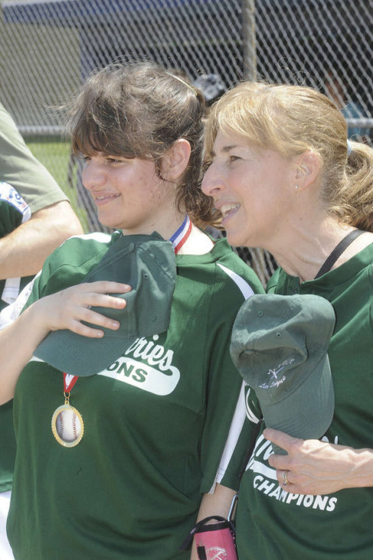 Coach Dawn Dinoto with her daughter Anisa who participated in the Norwalk little league challenger recognition day for athletes with special needs on Sunday in Norwalk. Hour photo/Matthew Vinci