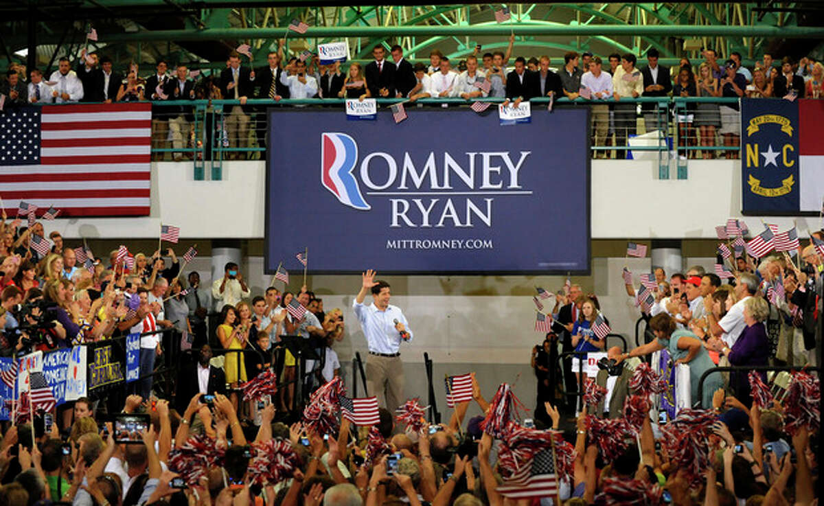 Republican vice presidential candidate, Rep. Paul Ryan, R-Wis., is welcomed after entering a campaign event at East Carolina University, Monday, Sept. 3, 2012, in Greenville, N.C. (AP Photo/Sara D. Davis)