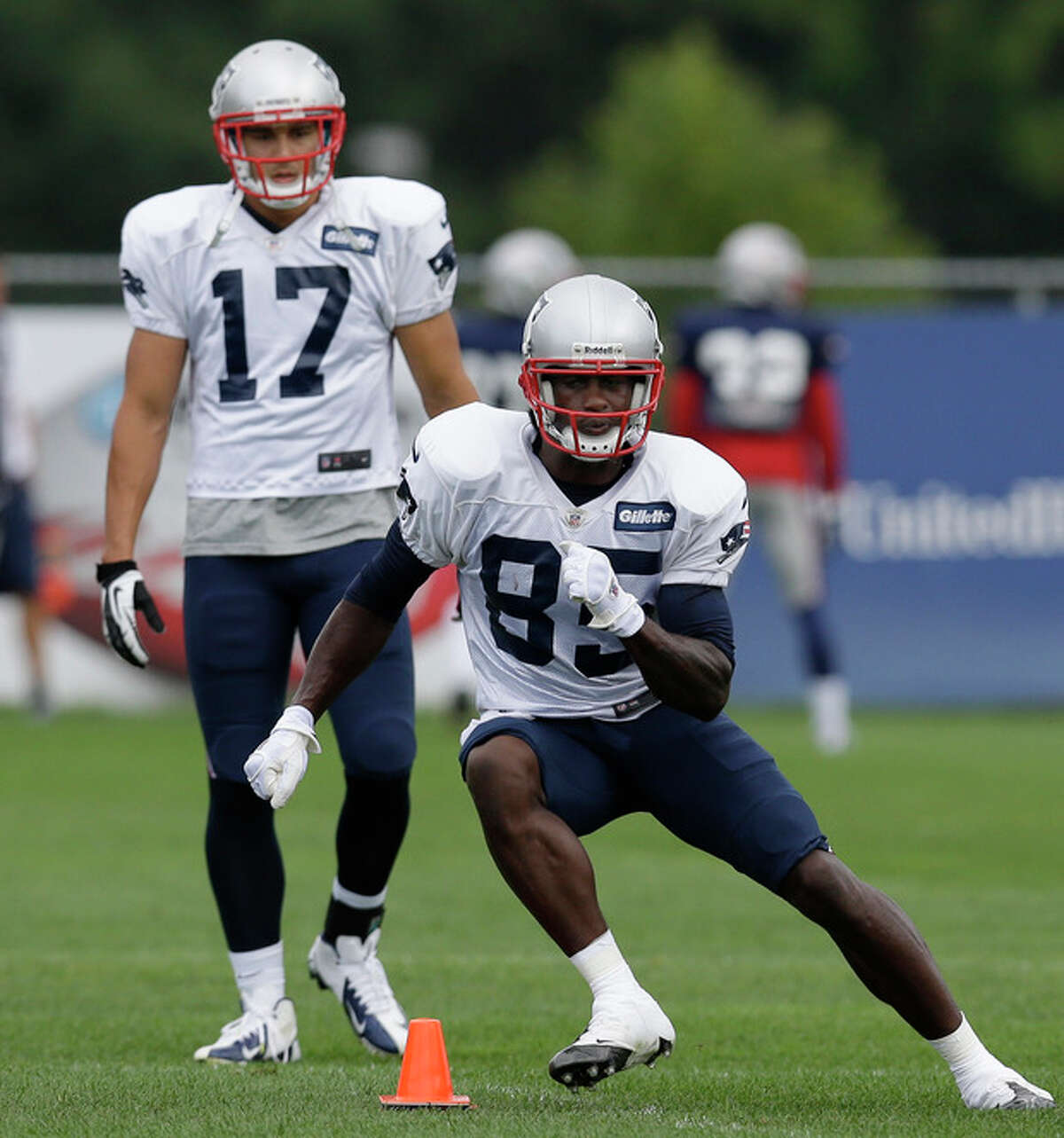 New England Patriots wide receiver Brandon Lloyd (85) cuts as wide receiver Greg Salas (17) watches during a practice drill at Gillette Stadium in Foxborough, Mass. Wednesday, Sept. 5, 2012. The Patriots are preparing for their NFL football season opener against the Tennessee Titans on Sunday. (AP Photo/Elise Amendola)