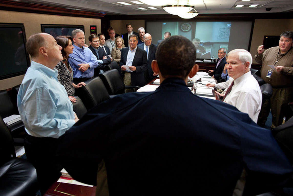 FILE ?– In this May 1, 2011, file photo released by the White House, President Barack Obama talks with members of the his national security team in the White House Situation Room during one in a series of meetings to discuss the mission against Osama bin Laden. As the world now knows well Obama ultimately decided to launch the raid on the Abbottabad compound that killed bin Laden, though faced with a level of widespread skepticism from a veteran intelligence analyst, skepticism shared with other top-level officials, which nearly scuttled the raid. That process reflected a sea change within the U.S. spy community, one that embraces debate to avoid ?“slam-dunk?” intelligence in tough national security decisions. (AP Photo/The White House, Pete Souza, File)