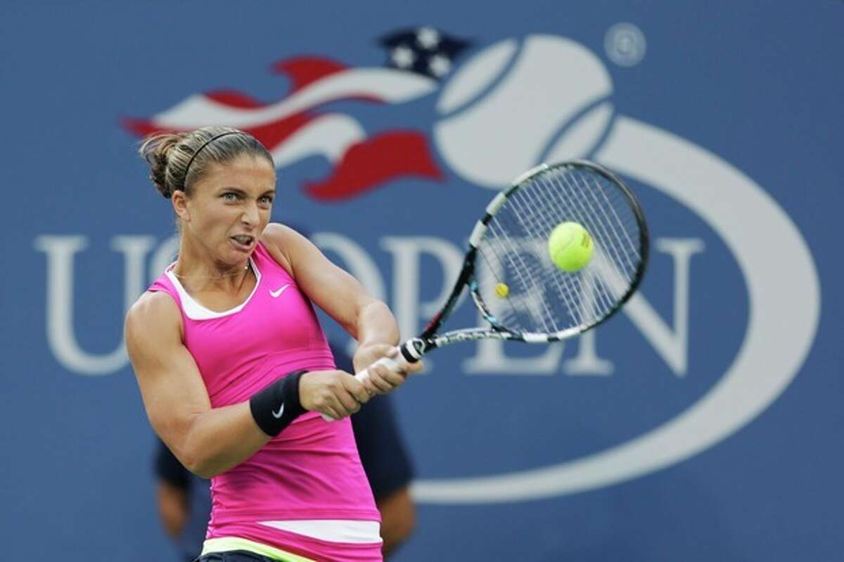 Italy's Sara Errani returns a shot to Serena Williams during a semifinal match at the 2012 US Open tennis tournament, Friday, Sept. 7, 2012, in New York. (AP Photo/Charles Krupa)