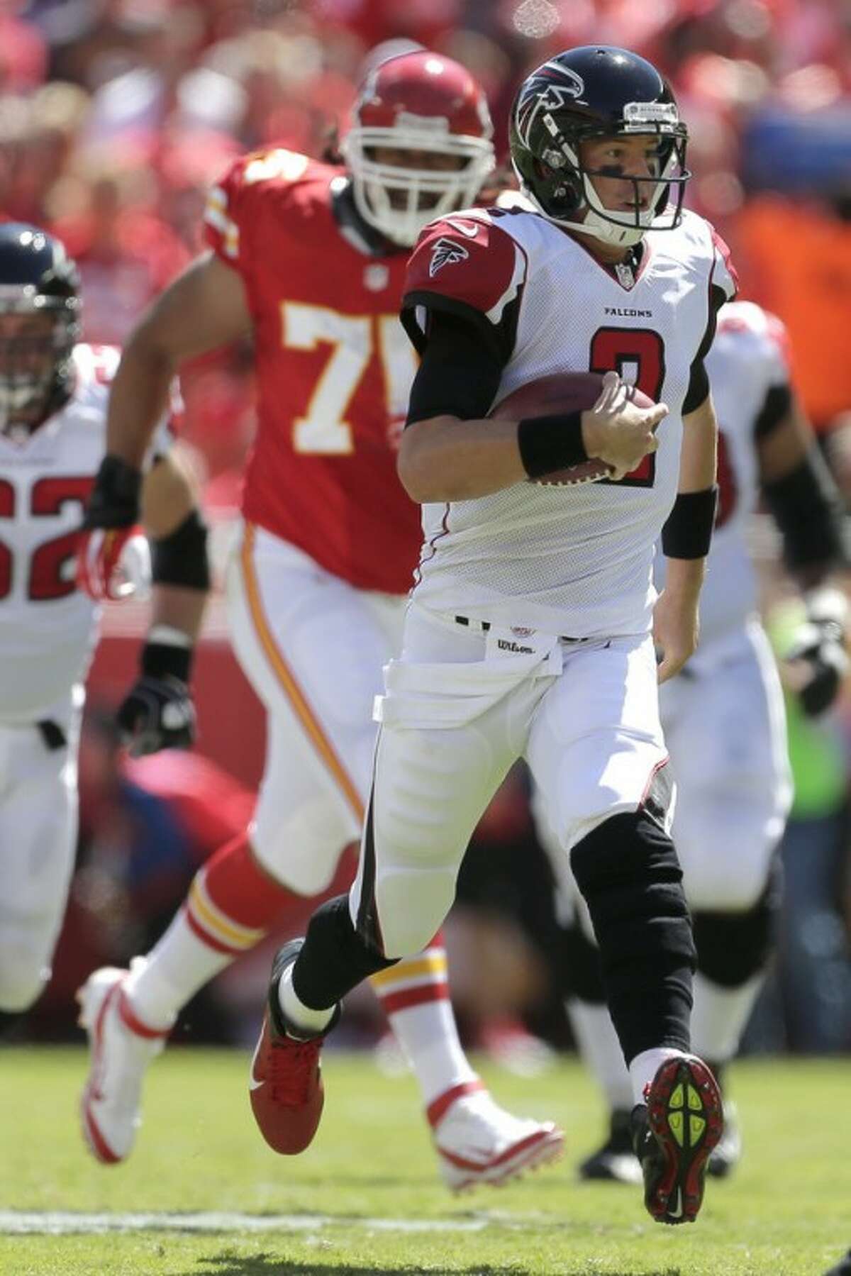 Atlanta Falcons quarterback Matt Ryan (2) runs the ball during the first half of an NFL football game against the Kansas City Chiefs, Sunday, Sept. 9, 2012, in Kansas City, Mo. (AP Photo/Charlie Riedel)