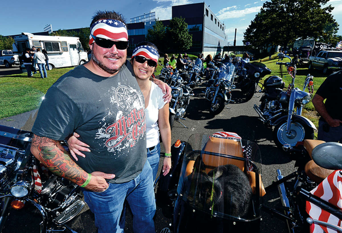Al and Laura Nathan and The CT United Ride tribute started out from Norden Park Sunday for the 12th annual motorcycle ride to benefit first responders and families affected by 9/11. Hour photo / Erik Trautmann