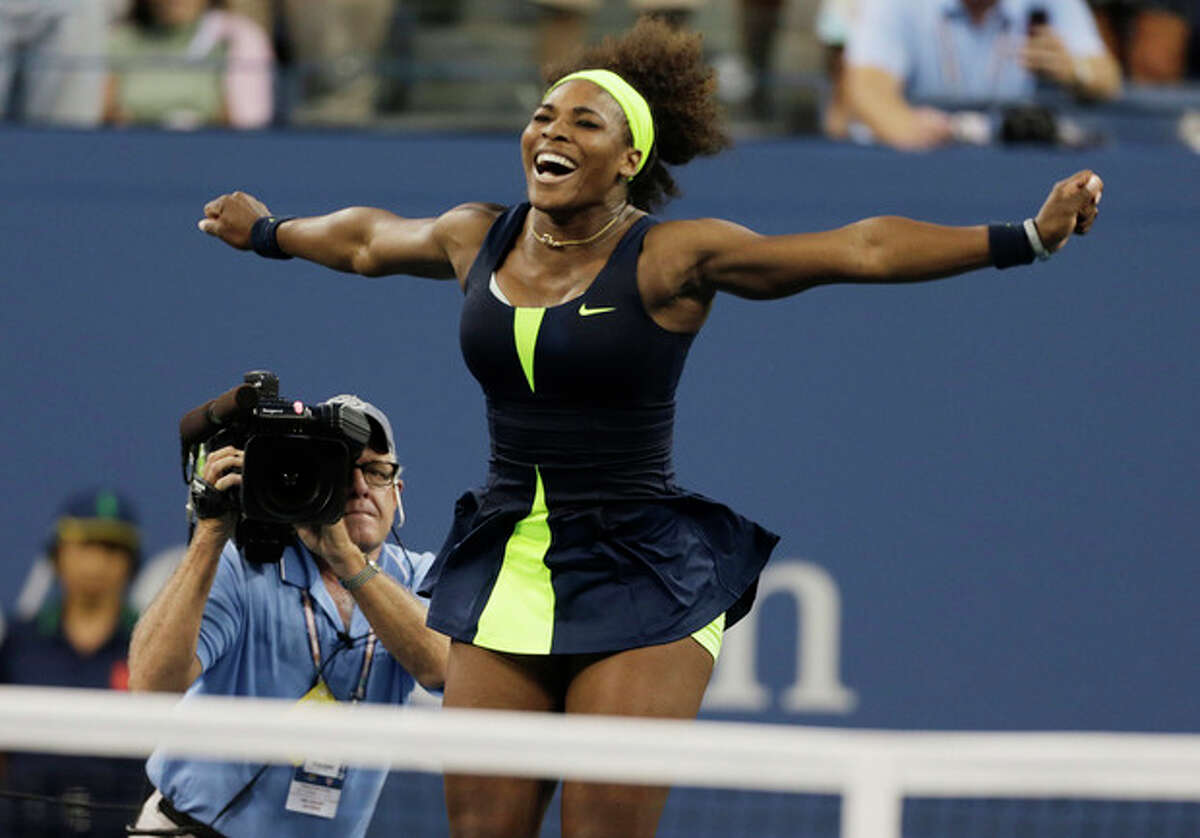 Serena Williams reacts after beating Victoria Azarenka, of Belarus, in the championship match at the 2012 US Open tennis tournament, Sunday, Sept. 9, 2012, in New York. (AP Photo/Charles Krupa)
