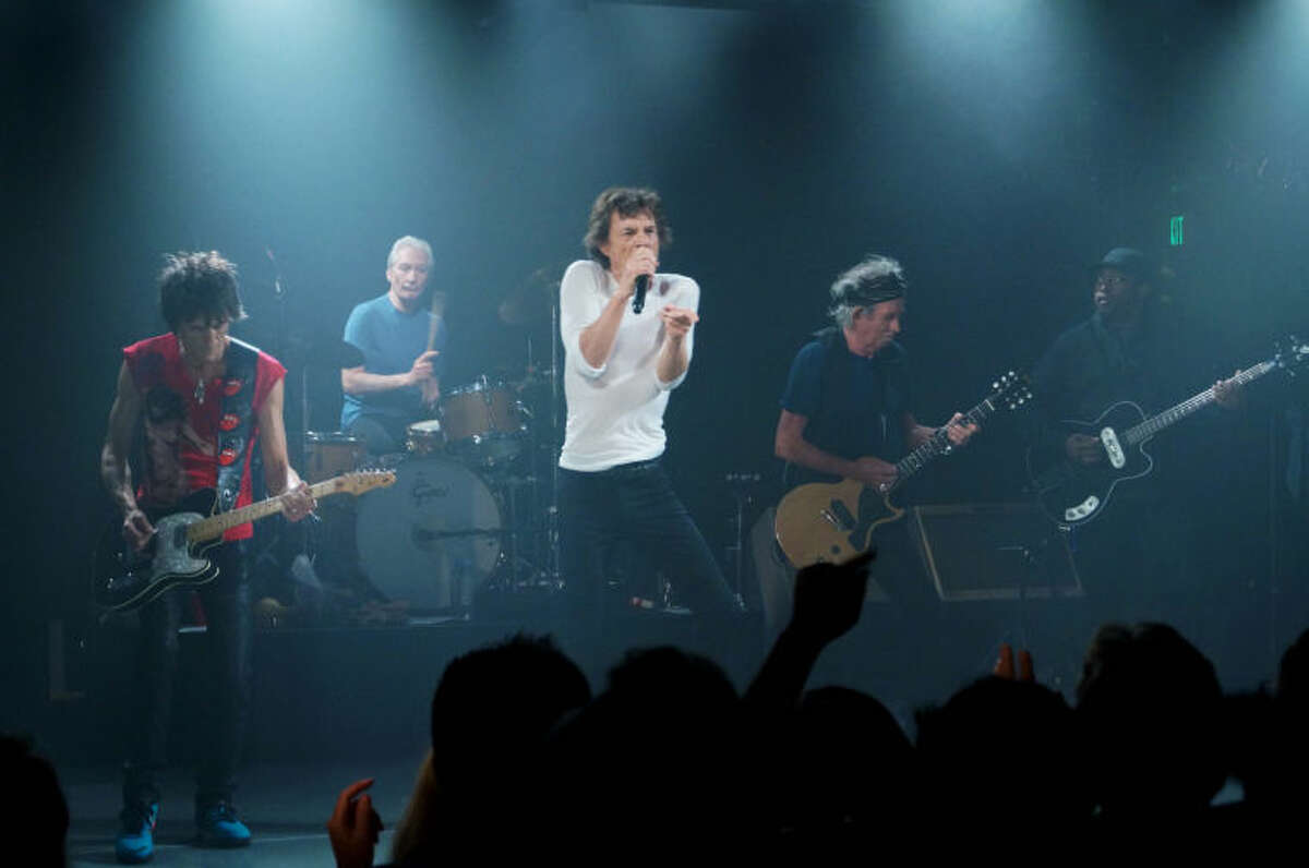 This Saturday, April 27, 2013 photo provided by The Rolling Stones shows the group performing during a surprise gig at the Echoplex in Los Angeles. The legendary group rocked a small club in Los Angeles on Saturday night for a minuscule crowd compared to the thousands set to see them launch their "50 and Counting" anniversary tour a week later on May 3 at the Staples Center. (AP Photo/The Rolling Stones, Luis Soto)