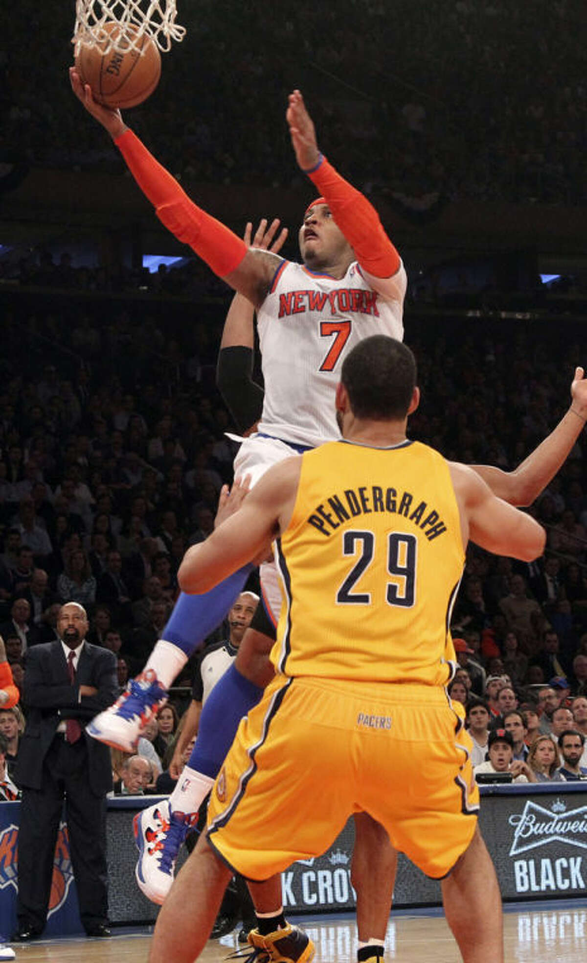 New York Knicks' Carmelo Anthony (7) shoots past Indiana Pacers' Jeff Pendergraph in the second half of Game 2 of their NBA basketball playoff series in the Eastern Conference semifinals at Madison Square Garden in New York, Tuesday, May 7, 2013. The Knicks won 105-79. (AP Photo/Mary Altaffer)