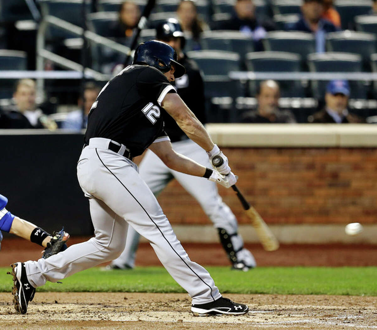 Chicago White Sox's Conor Gillaspie hits a two-RBI double during the third inning of a baseball game against the New York Mets at Citi Field, Wednesday, May 8, 2013 in New York. (AP Photo/Seth Wenig)