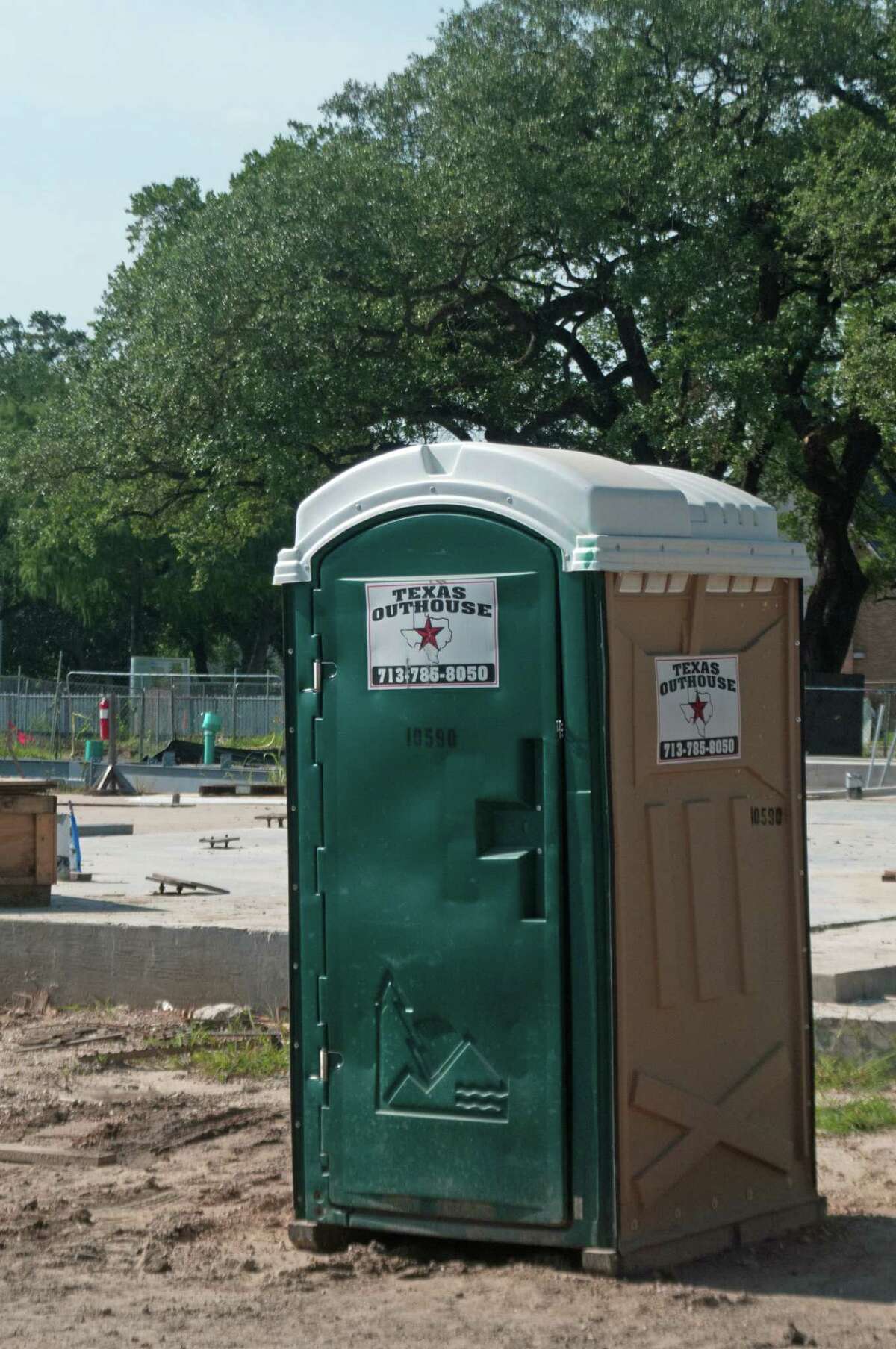 A portable toilet supplied by Texas Outhouse is available for the construction workers building the new EvelynÃ©?•s Park in Bellaire. Texas Outhouse has sued one of competitors, Texas Waste Co., in a trademark dispute over the use of the Texas map and star. Rick Campbell