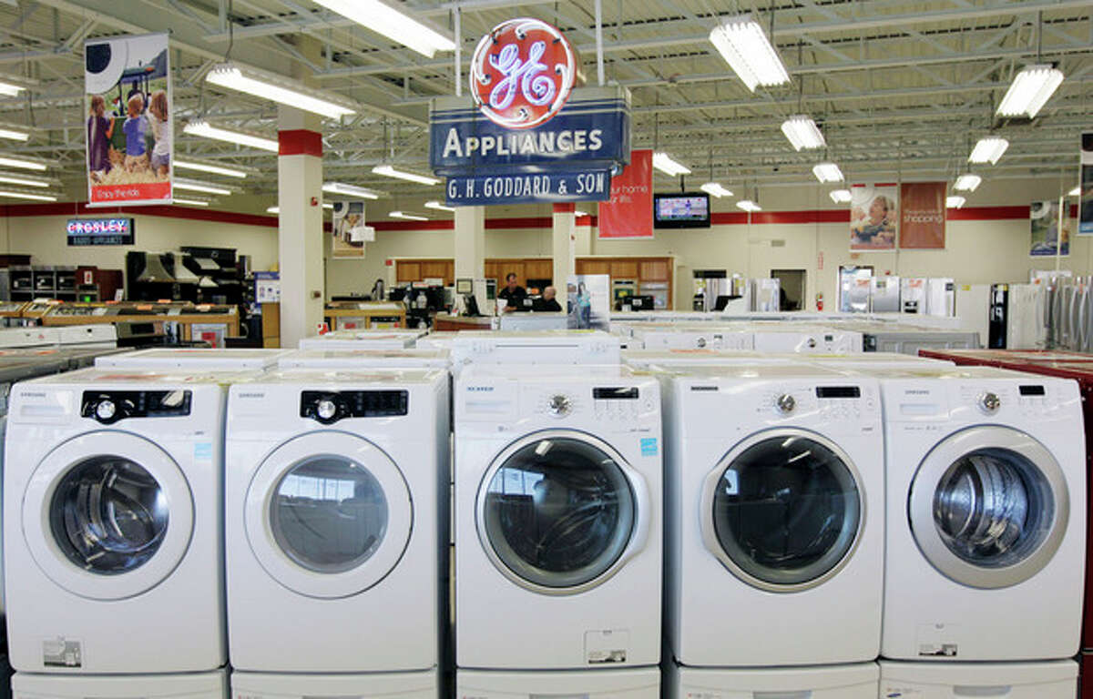 This Oct. 25, 2012 photo shows appliances on display at Orville's Home Appliances store in Amherst, N.Y. The government's snapshot Friday, Oct. 26, 2012, of the U.S. economy's growth will be its last before Americans choose a president in 11 days. It probably won't sway many undecided voters. The first of three estimates of growth for the July-September quarter will likely sketch a picture that's been familiar all year: The economy is growing at a tepid rate, slowed by high unemployment, corporate anxiety over an unresolved budget crisis and a global economic slowdown. The government's report covers gross domestic product. GDP measures the nation's total output of goods and services  from restaurant meals and haircuts to airplanes, appliances and highways. (AP Photo/David Duprey)