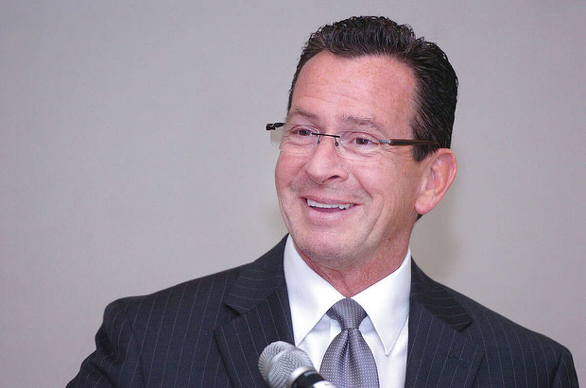Hour Photo Alex von Kleydorff; Governor Dannel Malloy has the Wilton Chamber laughing as the Keynote speaker at their annual dinner at Rolling Hills Country Club.