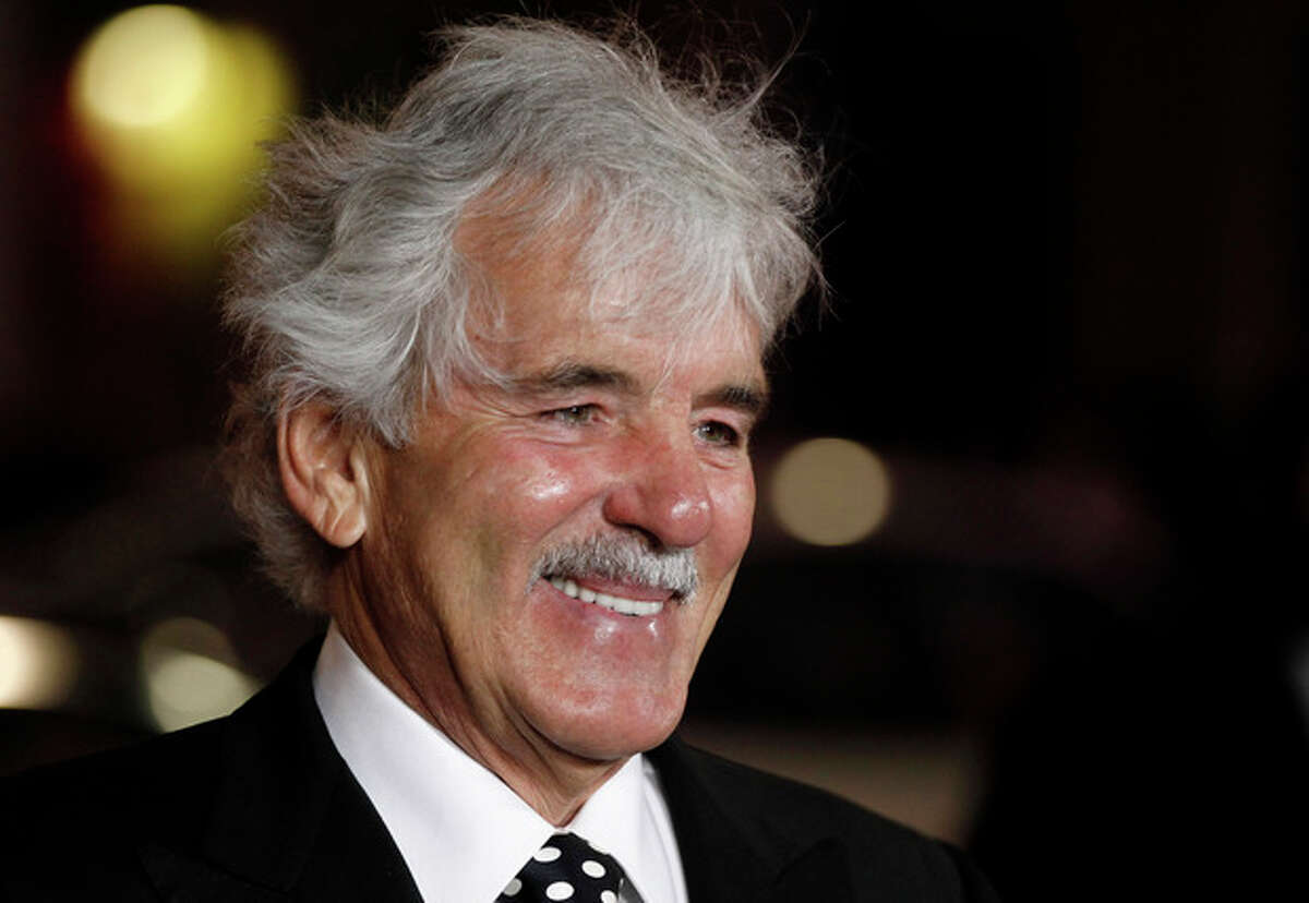 FILE - In this Jan. 25, 2012 file photo, Dennis Farina arrives at the premiere for the HBO television series "Luck" in Los Angeles. Farina died suddenly on Monday, July 22, 2013, in Scottsdale, AZriz., after suffering a blood clot in his lung. He was 69. (AP Photo/Matt Sayles, File)