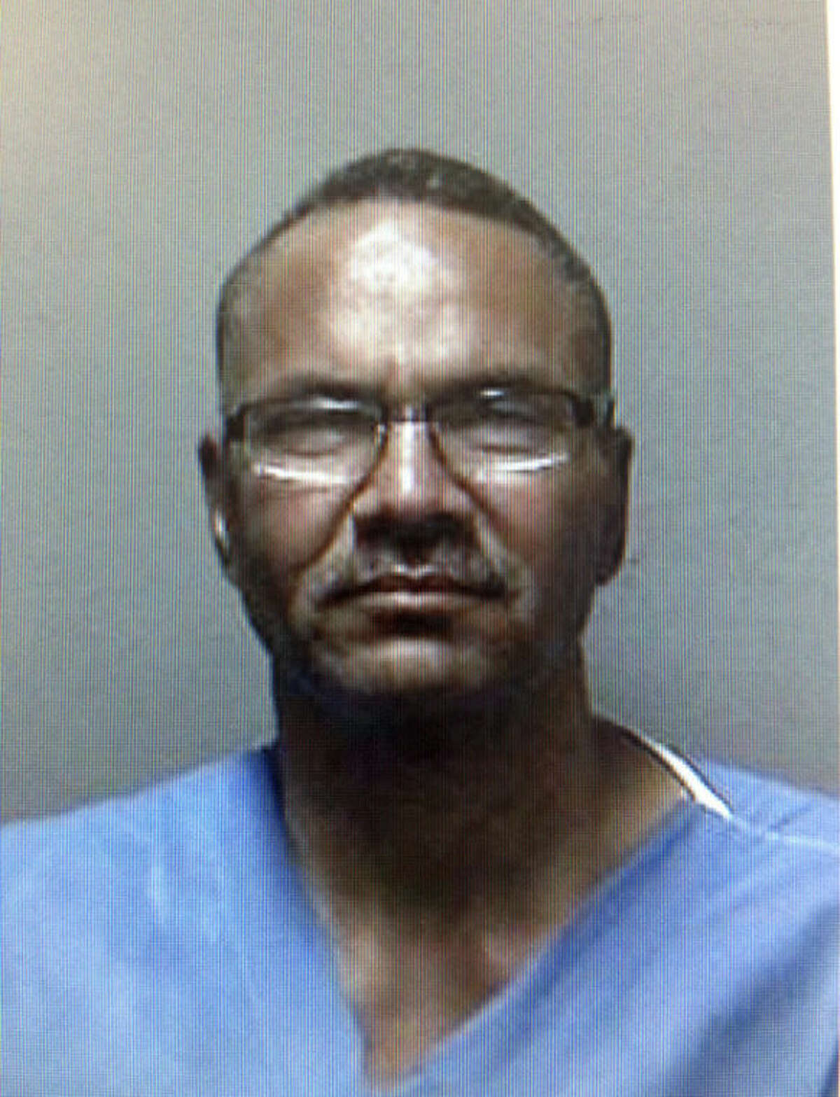 This image provided by the Oakland Police Department shows an undated booking photo of Randy Alana, 56. Oakland Police Officer Johnna Watson said Alana, a parolee from Oakland, was taken into custody on Tuesday Aug. 6, 2013 and is being questioned about his ties to Sandra Coke after investigators discovered he was with Coke on Sunday. Coke, a capital case investigator for the federal public defender's office in Sacramento, was last seen in Oakland on Sunday. (AP Photo/Oakland Police Department)
