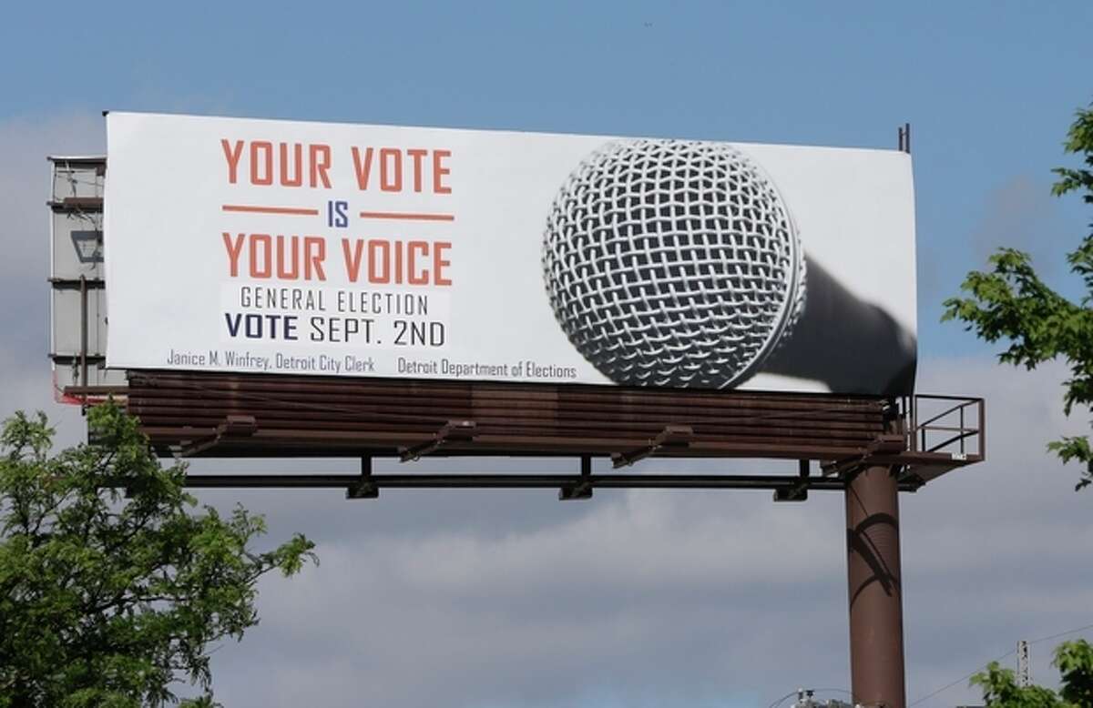 One of the billboards seen on Tuesday, Aug. 13, 2013, promoting Detroit's upcoming general election offered up some erroneous information about when to go to the polls. The Detroit Free Press reports that many of the 14 billboards gave a September date for the election. The vote will actually take place Nov. 5. City Clerk Janice Winfrey says the billboards were updated Saturday with information about the general election, and she calls the September date "a mistake" by the business that handles the billboards. (AP Photo/Carlos Osorio)