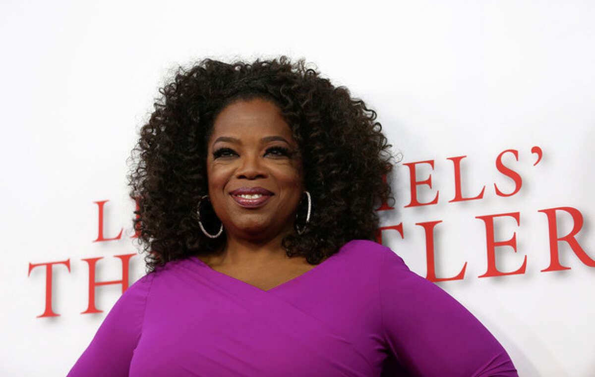Oprah Winfrey arrives at the Los Angeles premiere of "Lee Daniels' The Butler" at the Regal Cinemas L.A. Live Stadium 14 on Monday, Aug. 12, 2013. (Photo by Matt Sayles/Invision/AP)