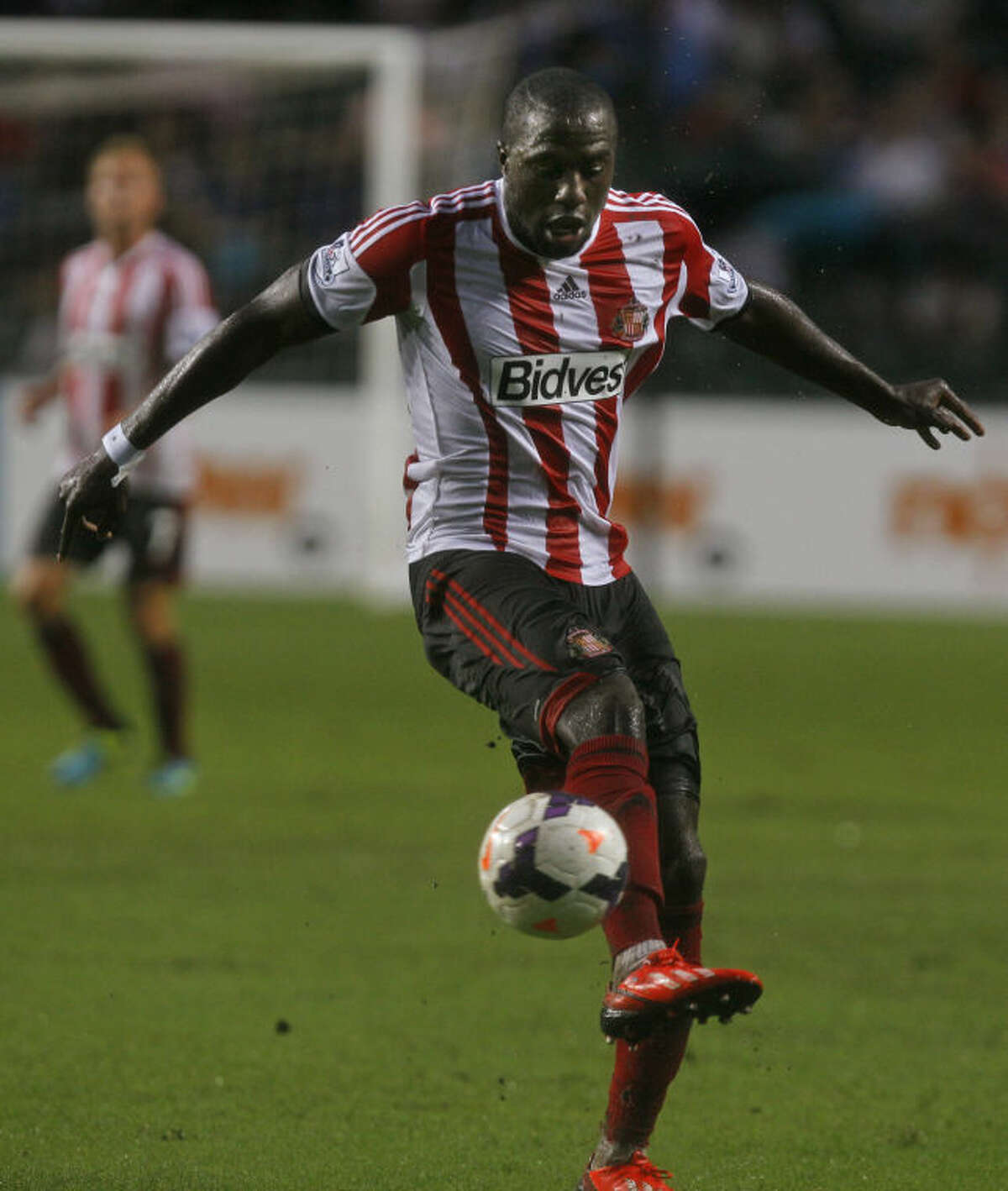Jozy Altidore of Sunderland controls the ball during the match against Tottenham Hotspur at the Barclays Asia Trophy Wednesday, July 24, 2013. (AP Photo/Kin Cheung)