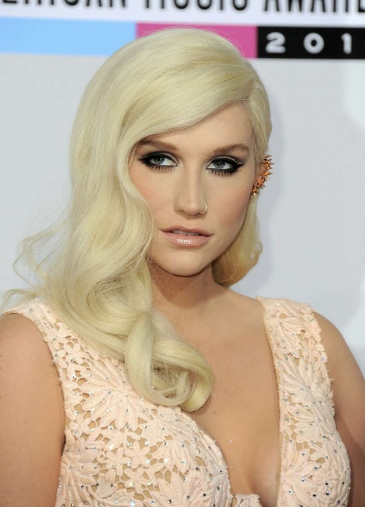 Ke$ha arrives at the 40th Anniversary American Music Awards on Sunday, Nov. 18, 2012, in Los Angeles. (Photo by Jordan Strauss/Invision/AP)