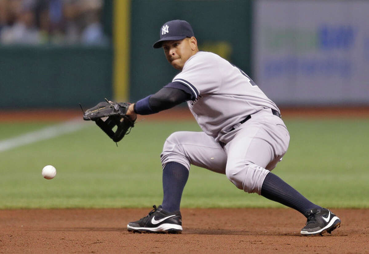 New York Yankees third baseman Alex Rodriguez cannot field a first-inning double hit by Tampa Bay Rays' Evan Longoria off pitcher CC Sabathia during a baseball game on Saturday, Aug. 24, 2013, in St. Petersburg, Fla. (AP Photo/Chris O'Meara)