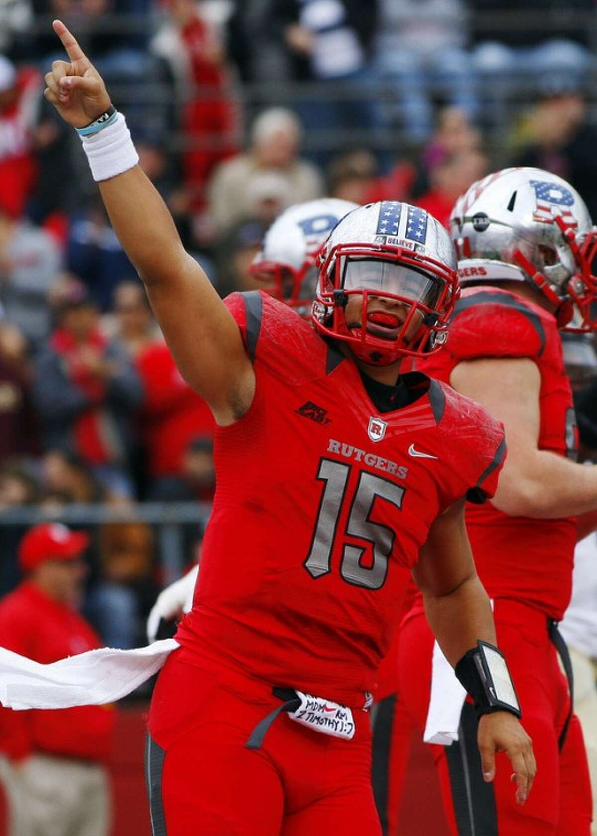 FILe p- This Nov. 10, 2012 file photo shows Rutgers quarterback Gary Nova (15) gesturing after a touchdown pass against Army in first half of an NCAA college football game in Piscataway, N.J. . Rutgers is announcing that it will join the Big Ten at an afternoon news conference Tuesday, Nov. 20, 2012, on its campus in Piscataway, N.J. (AP Photo/Rich Schultz, File)