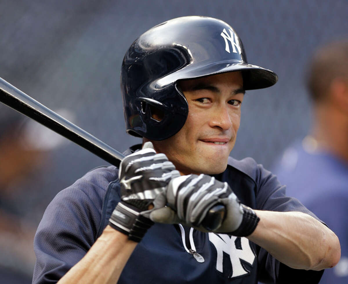 New York Yankees' Ichiro Suzuki warms up for a baseball game against the Toronto Blue Jays at Yankee Stadium, Wednesday, Aug. 21, 2013, in New York. Entering the game, Suzuki is one hit away from reaching the 4,000 career hits plateau, combining his record from Japan's Pacific League and major league baseball. (AP Photo/Kathy Willens)