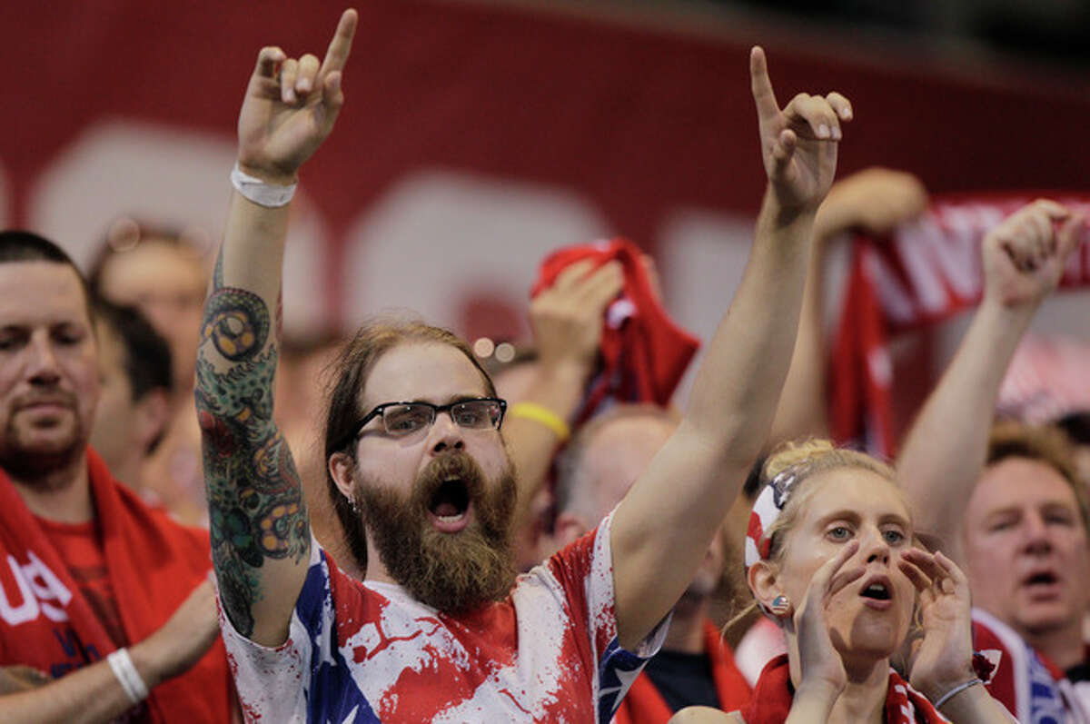 United States fans cheers on their team against Mexico during the first half of a World Cup qualifying soccer match Tuesday, Sept. 10, 2013, in Columbus, Ohio. (AP Photo/Jay LaPrete)