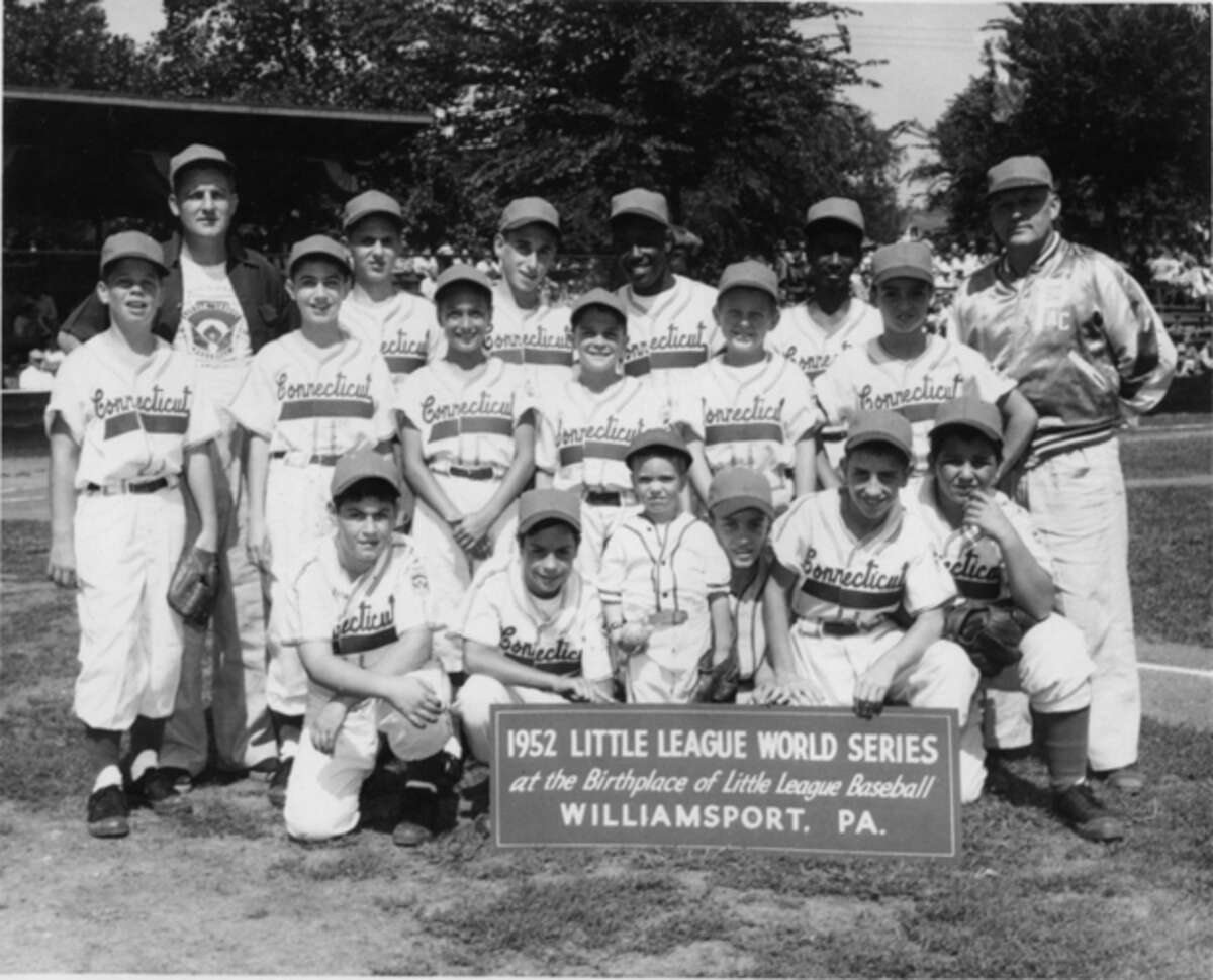 1960s TWO BOYS PITCHER AND CATCHER IN LITTLE LEague baseball