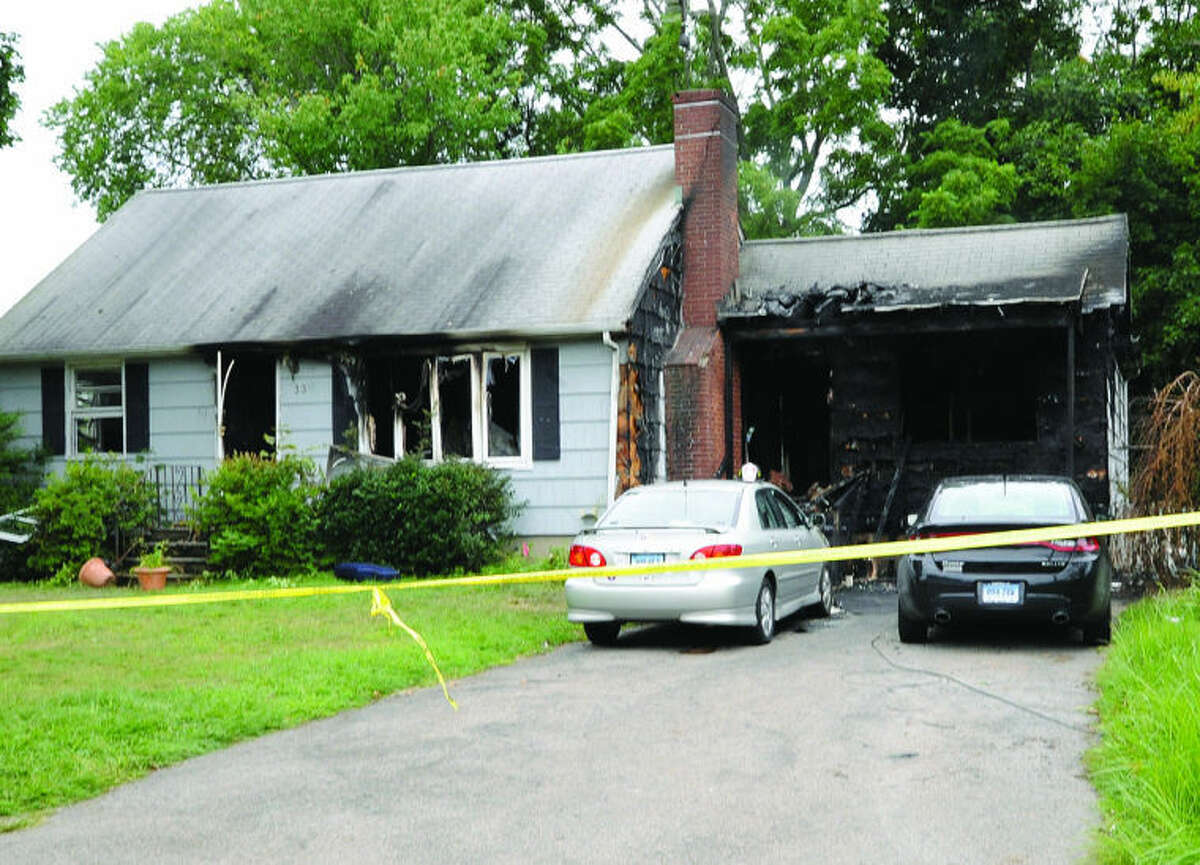 Fire destroyed a home on Pettom road Sunday morning. Hour photo/Matthew Vinci
