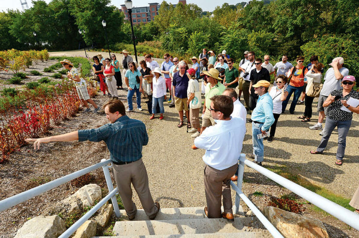 Casey Lee and Luke McCoy of BSC landscaping architecture lead a tour of Norwalk’s Oyster Shell Park Thursday for The Ecological Landscaping Association. Oyster Shell Park is part of the State of Connecticut Heritage Park System and is one of the Pilot Projects for the SITES Sustainable Sites Initiative, a partnership of the American Society of Landscape Architects, the Lady Bird Johnson Wildflower Center at the University of Texas and the United State Botanical Garden. Hour photo / Erik Trautmann