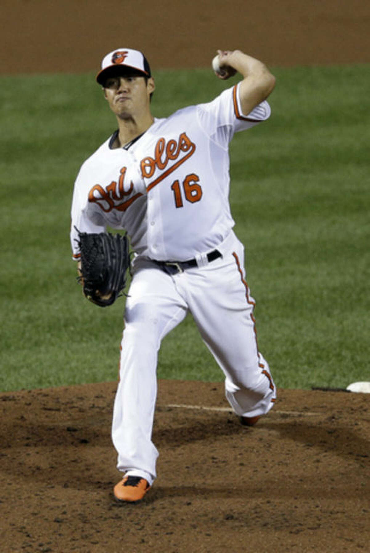 Baltimore Orioles starting pitcher Wei-Yin Chen, of Taiwan, throws to a New York Yankees in the third inning of a baseball game, Thursday, Sept. 12, 2013, in Baltimore. (AP Photo/Patrick Semansky)