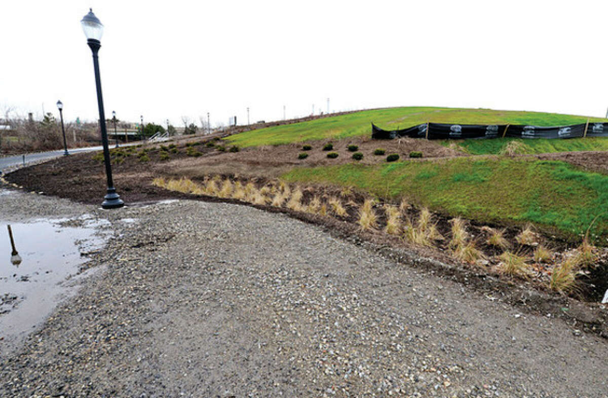 Phase One improvements to Oyster Shell Park are near completion Thursday. The project added drainage, hardscape, landscaping and lighting to the hillside park adjacent to the Norwalk River and Interstate 95. Hour photo / Erik Trautmann