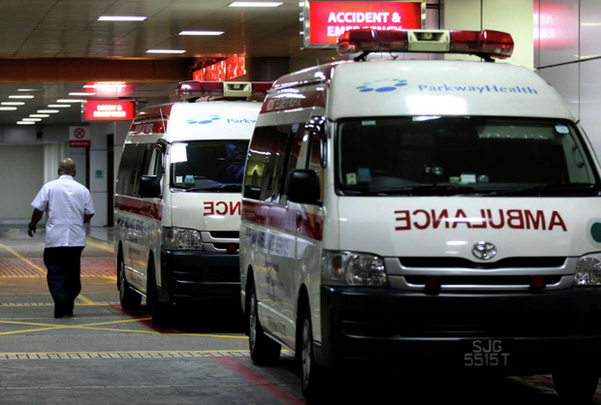 Ambulances are parked outside the accident and emergency entrance at Mount Elizabeth Hospital in Singapore, late Friday Dec. 28, 2012. After 10 days at a New Delhi hospital, the victim of a gang-rape in New Delhi was flown to Singapore on Thursday for treatment at the Mount Elizabeth hospital. The young woman's condition had "taken a turn for the worse" and her vital signs had deteriorated with indications of severe organ failure, said Dr. Kelvin Loh, the chief executive officer of Singapore's Mount Elizabeth hospital. (AP Photo/Wong Maye-E)