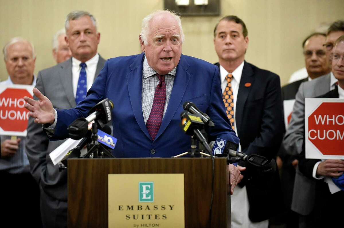 Tom Durkin, former announcer for NYRA, center, speaks as Concerned Citizens for Saratoga Racing call on legislators to reprivatize NYRA as a not-for-profit corporation on Wednesday, June 15, 2016, at Embassy Suites Hotel in Saratoga Springs, N.Y. (Cindy Schultz / Times Union)