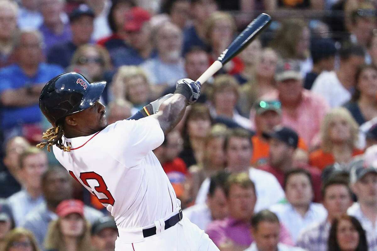 Boston Red Sox first baseman Hanley Ramirez takes his bat with him as