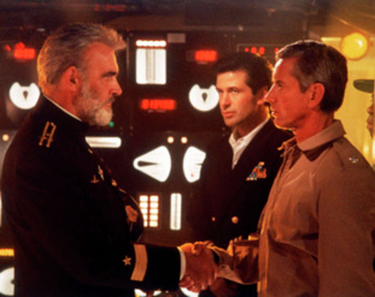 FILE - This undated file image provided by Paramount Studios shows a scene from "The Hunt for Red October" starring, from left, Sean Connery, Alec Baldwin and Scott Glenn. The film is based on the book by Tom Clancy. Clancy, the bestselling author of "The Hunt for Red October" and other wildly successful technological thrillers, has died. He was 66. Penguin Group (USA) said Wednesday, Oct. 2, 2013, that Clancy died Tuesday in Baltimore. The publisher did not disclose a cause of death. (AP Photo/Paramount Studios)