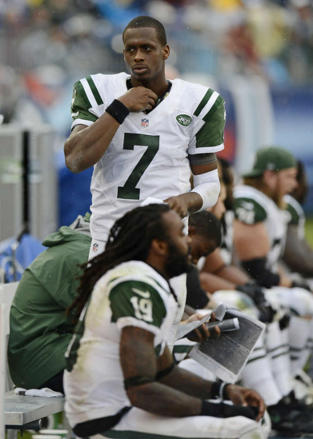 New York Jets quarterback Geno Smith (7) walks on the sideline in the fourth quarter of an NFL football game against the Tennessee Titans on Sunday, Sept. 29, 2013, in Nashville, Tenn. The Titans won 38-13. (AP Photo/Mark Zaleski)