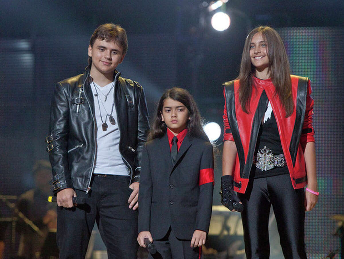 FILE - In this Oct. 8, 2011 file photo, from left, Prince Jackson, Prince Michael II "Blanket" Jackson and Paris Jackson arrive on stage at the Michael Forever the Tribute Concert, at the Millennium Stadium in Cardiff, Wales. A Los Angeles jury on Wednesday, Oct. 2, 2013, rejected a negligence lawsuit by singer Michael Jackson's mother, Katherine Jackson, against AEG Live LLC that claimed the concert promoter was responsible for hiring the doctor convicted of causing her sons 2009 death. (AP Photo/Joel Ryan, file) *Editorial Use Only*