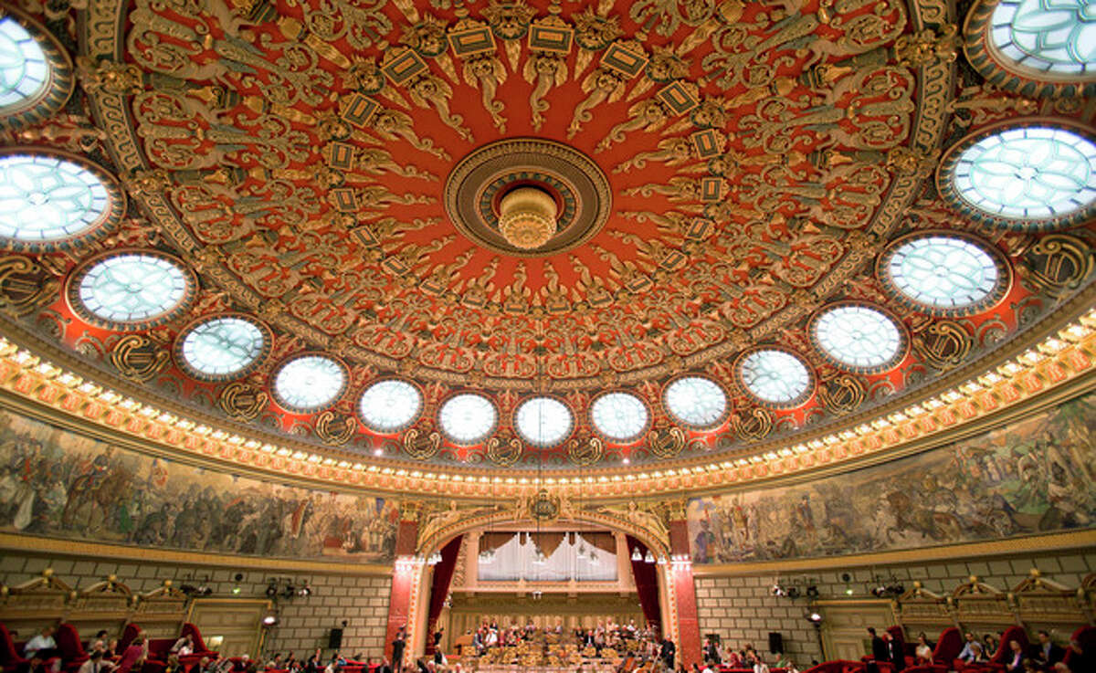 This Sept. 24, 2013 photo shows the main concert hall at the Romanian Athenaeum in Bucharest, Romania, before a concert of the George Enescu classical music festival. The festival which began in 1958 is named after Romanian composer, violinist and conductor George Enescu, who lived in Romania and moved to Paris when the communists came to power. (AP Photo/Vadim Ghirda)