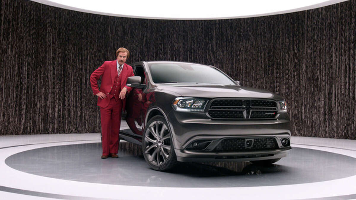 This undated photo provided by Chrysler shows Will Farrell as the 'Anchorman' character Ron Burgundy as part of the new 2014 Dodge Durango advertisement. The campaign, scheduled to appear on TV until the sequel "Anchorman 2: The Legend Continues" makes its debut around Christmas, could alienate those didn't see the first movie or those who didn't like it. (AP Photo/Chrysler)