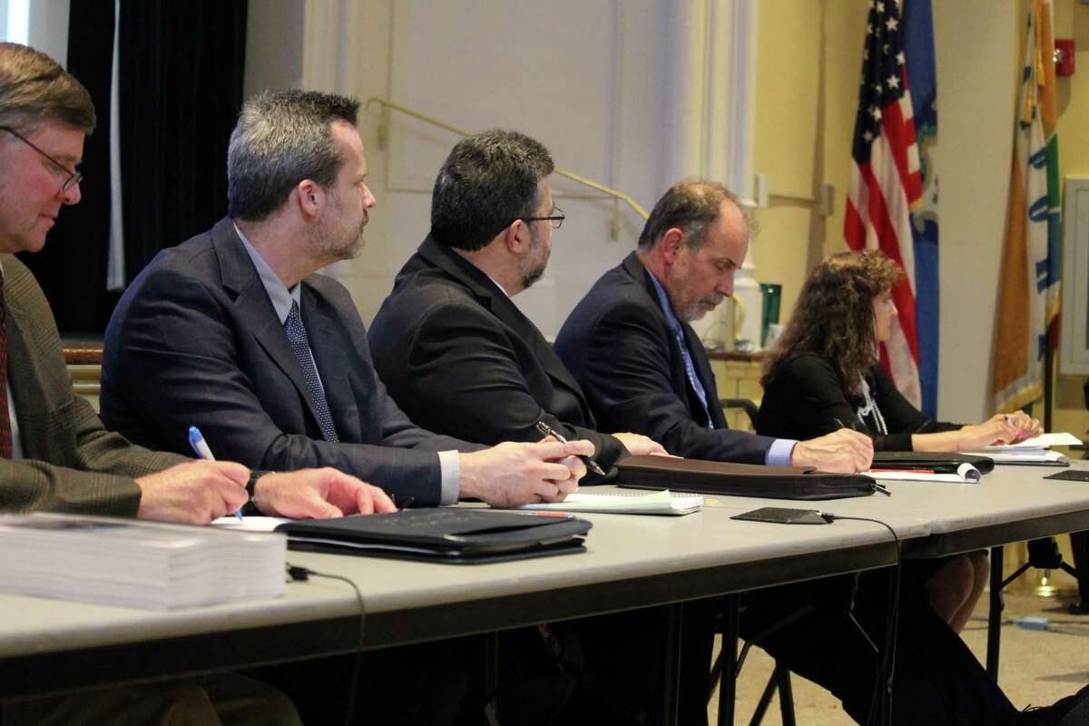 A panel of DOT representatives listens to residents' questions on the fate of the Saugatuck Swing Bridge at Town Hall on June 6,2016 in Westport, CT.