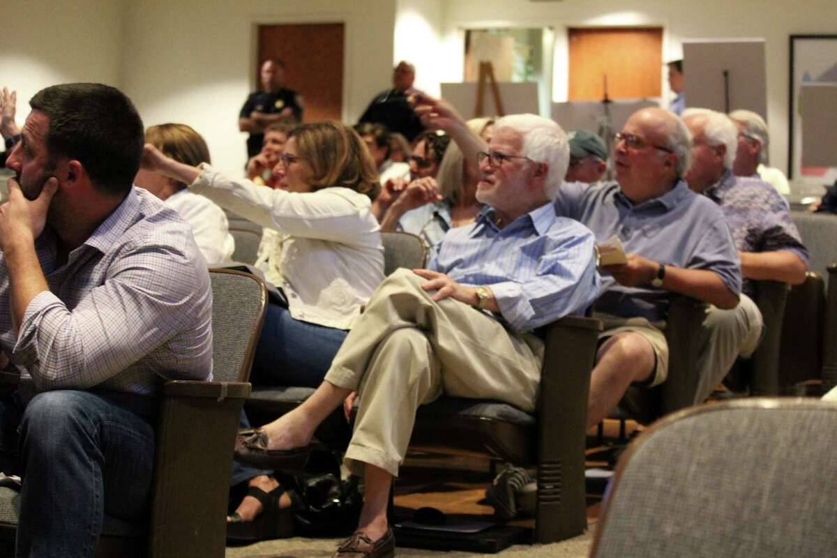 The audience reacts to the DOT at a meeting on the fate of the Saugatuck Swing Bridge at Town Hall on June 6,2016 in Westport, CT.
