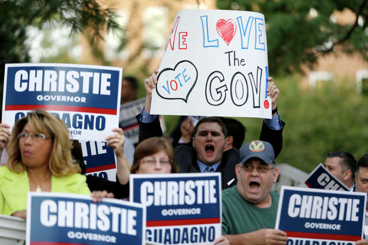 Supporters of Republican New Jersey Gov. Chris Christie gather before Christie and Democratic challenger Barbara Buono meet for a gubernatorial debate at William Paterson University, Tuesday, Oct. 8, 2013, in Wayne, N.J. (AP Photo/Julio Cortez)