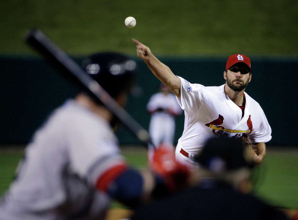 St. Louis Cardinals starting pitcher Adam Wainwright throws during the first inning of Game 5 of baseball's World Series against the Boston Red Sox Monday, Oct. 28, 2013, in St. Louis. (AP Photo/David J. Phillip)