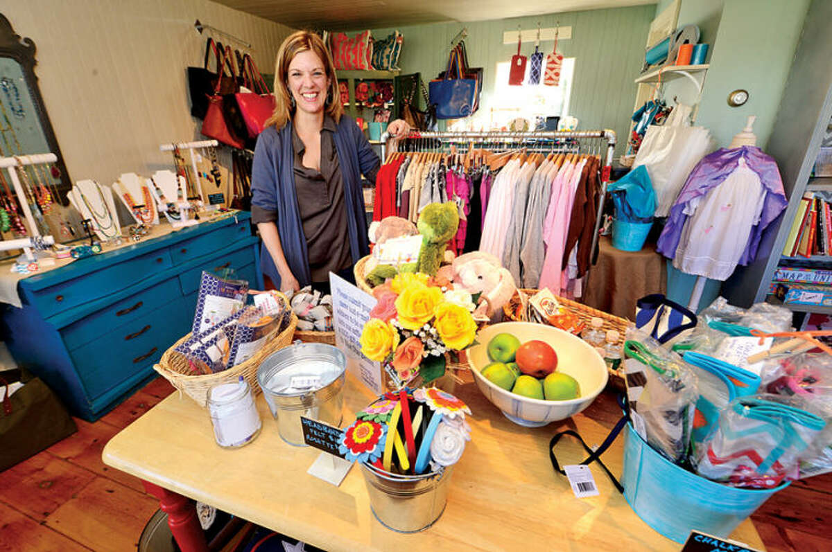 Hour photo / Erik Trautmann Megan Abrahamsen, Blue Star Bazaar owneropens her boutique at 146 Danbury Road, Wilton, CT in the Old Hurlbutt Street Post Office at Lambert Corner. The shop features apparel for women and children, accessories including jewelry, handbags, and scarves as well as heirloom quality toys.