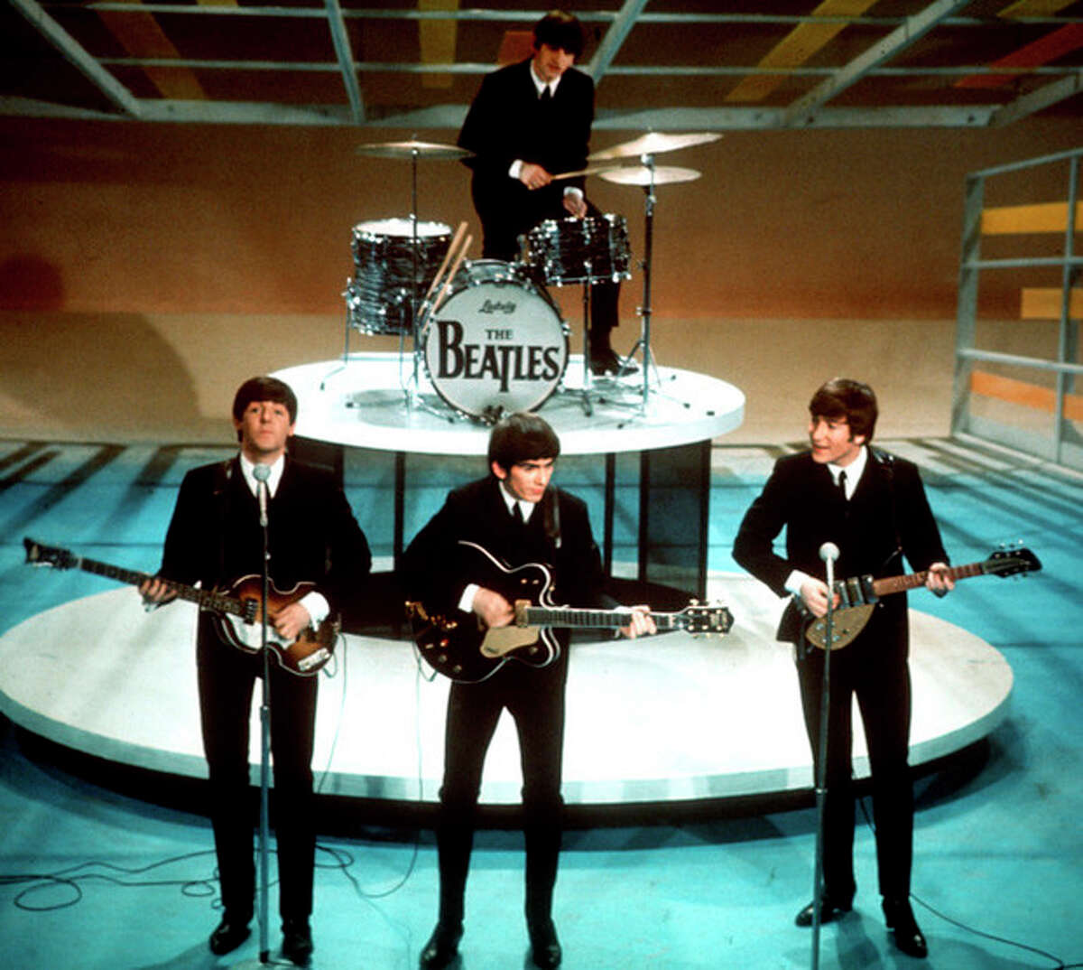 FILE - In this Feb. 9, 1964 file photo, The Beatles, clockwise from top, Ringo Starr, John Lennon, George Harrison and Paul McCartney, perform on CBS' "Ed Sullivan Show" in New York. CBS is planning a two-hour special on Feb. 9, 2014, to mark the 50th anniversary of the Beatles groundbreaking first appearance on The Ed Sullivan Show. (AP Photo, file)