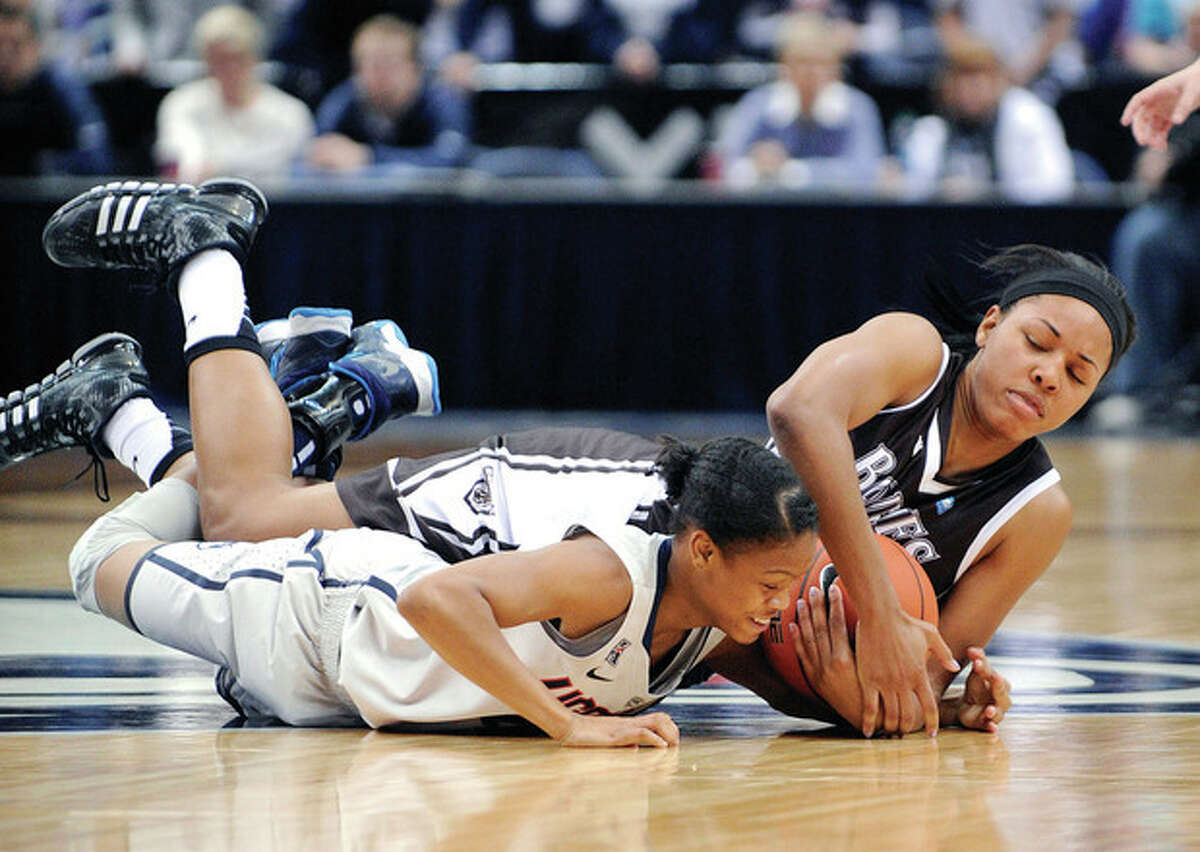 AP photo Connecticut's Moriah Jefferson, front, and St. Bonaventure's Gabby Richmond fight for a loose ball during the first half of Sunday's game in Hartford. The Huskies won 88-39.