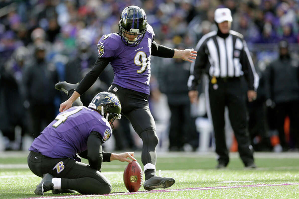 Baltimore Ravens' Justin Tucker (9) kicks a field goal during the first half of an NFL football game against the New York Jets in Baltimore, Md., Sunday, Nov. 24, 2013. (AP Photo/Patrick Semansky)