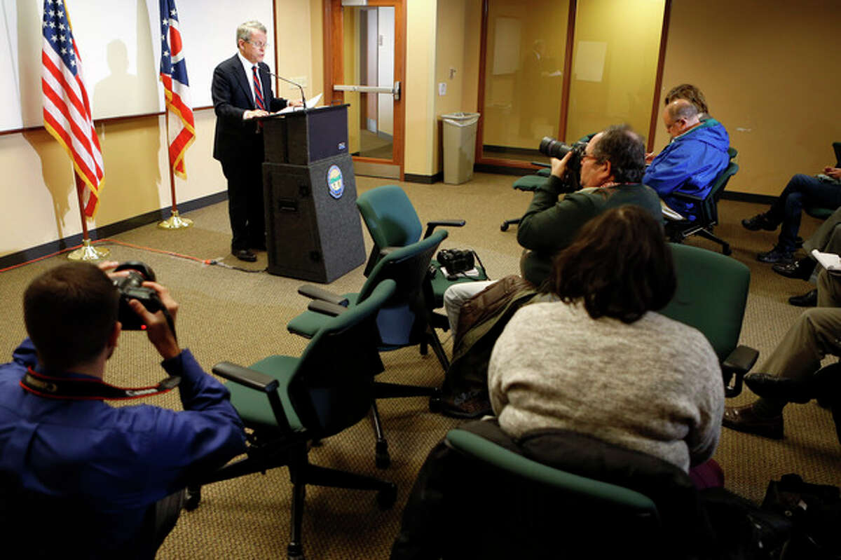 Ohio Attorney General Mike DeWine answers questions at a news conference where he announced indictments against four additional people in relation to the 2012 rape of a high school student on Monday, Nov. 25, 2013 in Steubenville, Ohio. The charges against Superintendent Mike McVey include felony counts of obstructing justice, DeWine said. An elementary school principal, Lynnett Gorman, 40, and a strength coach, Seth Fluharty, 26, are charged with failing to report possible child abuse. A former volunteer coach, Matthew Bellardine, 26, faces several misdemeanor charges, including making false statements and contributing to underage alcohol consumption. (AP Photo/Keith Srakocic)