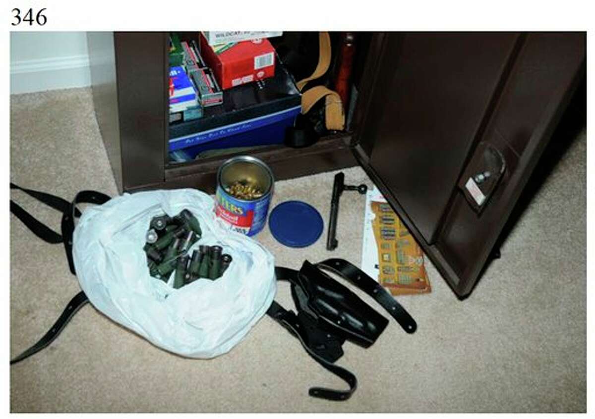 This image contained in the "Appendix to Report on the Shootings at Sandy Hook Elementary School and 36 Yogananda St., Newtown, Connecticut On December 14, 2012" and released Monday, Nov. 25, 2013, by the Danbury, Conn., State’s Attorney shows a scene at 36 Yogananda St., where gunman Adam Lanza lived with his mother in Newtown, Conn. Lanza opened fire inside the school killing 20 first-graders and six educators before killing himself as police arrived. (AP Photo/Office of the Connecticut State's Attorney Judicial District of Danbury)