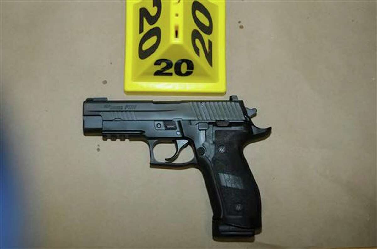 This image contained in the "Appendix to Report on the Shootings at Sandy Hook Elementary School and 36 Yogananda St., Newtown, Connecticut On December 14, 2012" and released Monday, Nov. 25, 2013, by the Danbury, Conn., State’s Attorney shows a weapon at Sandy Hook Elementary School in Newtown, Conn. Adam Lanza opened fire inside the school killing 20 first-graders and six educators before killing himself as police arrived. (AP Photo/Office of the Connecticut State's Attorney Judicial District of Danbury)