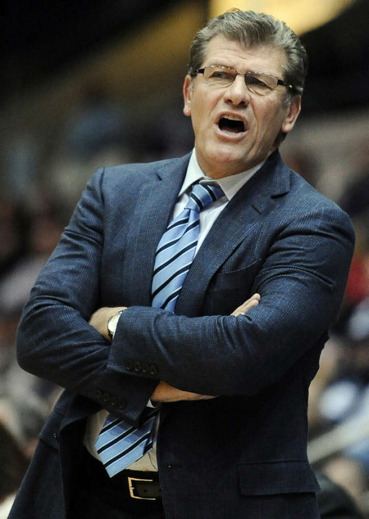 Connecticut head coach Geno Auriemma stands during the second half of an NCAA college basketball game against Ohio State, Sunday, Dec. 1, 2013, in Springfield, Mass. Connecticut won 70-49. (AP Photo/Jessica Hill)
